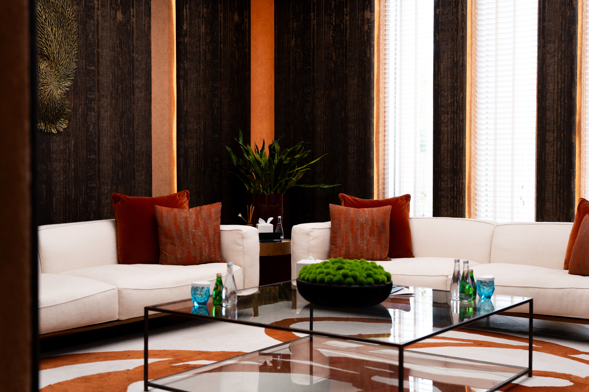 The private LifeCore lounge in Abu Dhabi, a quiet reception space with natural light, warm textures and considered detail.